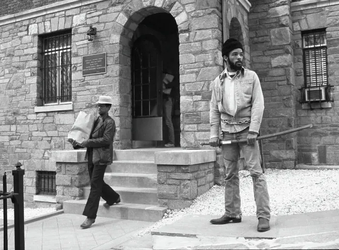 Framed Print : Black Hanafi Muslim Stands Guard Framed Print : Black Hanafi Muslim Stands Guard