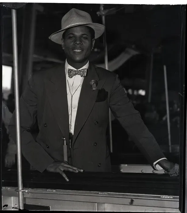 Framed Print : Black Pilot Aboard Boat