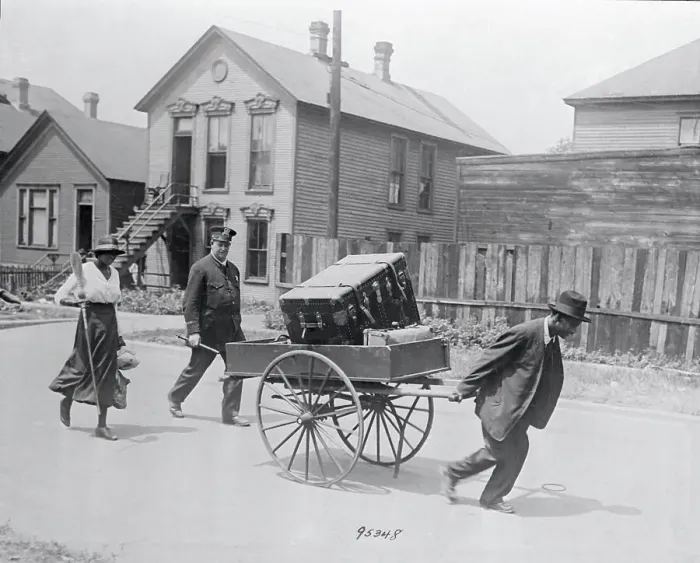Framed Print : Black Residents Moving Belongings Framed Print : Black Residents Moving Belongings