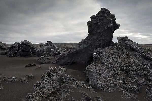 Black sand and piled up lava, Reykjanesskagi, Southern Peninsula or Reykjanes, Iceland