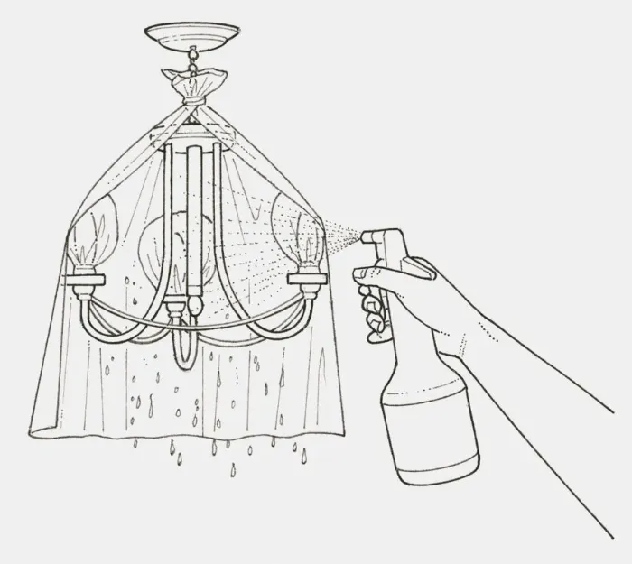 Framed Print : Black and white illustration of hand cleaning a chandelier with spray can, plastic bags tied over bulbs and a plastic sheet tied to the light for protection