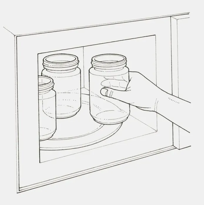 Framed Print : Black and white illustration of hand placing glass jars into microwave to sterilise them Framed Print : Black and white illustration of hand placing glass jars into microwave to sterilise them