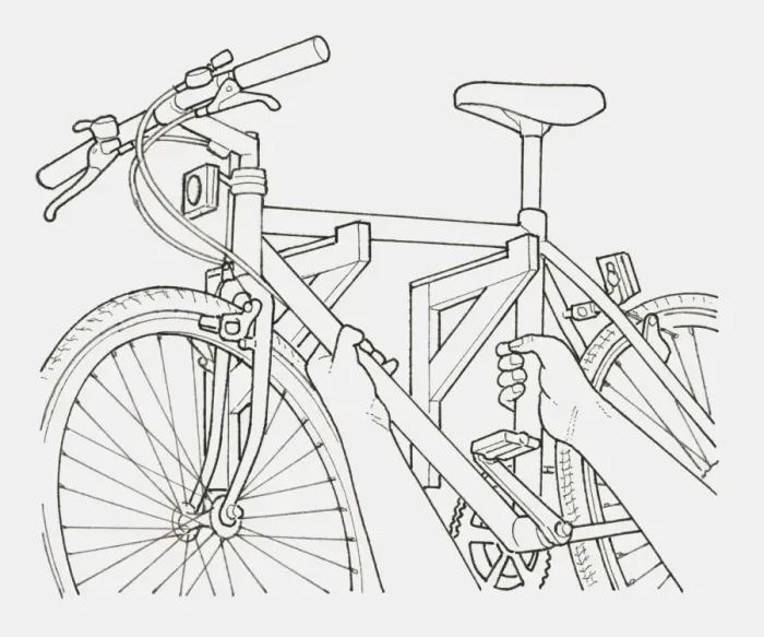 Framed Print : Black and white illustration of hands hanging a bicycle on a pair of brackets on a wall Framed Print : Black and white illustration of hands hanging a bicycle on a pair of brackets on a wall
