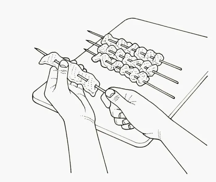 Framed Print : Black and white illustration of putting filleted fish on skewers Framed Print : Black and white illustration of putting filleted fish on skewers