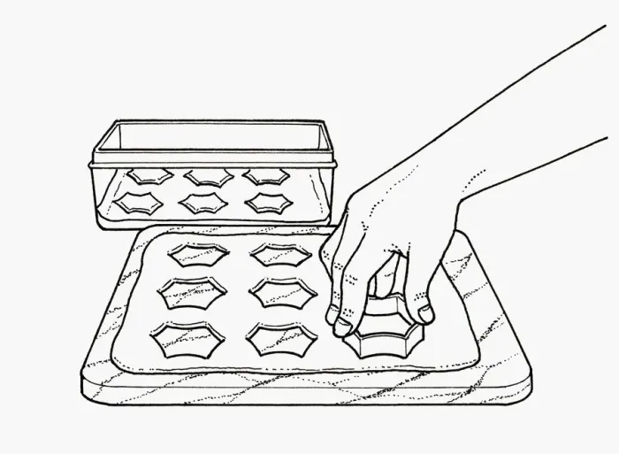 Framed Print : Black and white illustration using pastry cutter to cut shapes from pastry on chopping board Framed Print : Black and white illustration using pastry cutter to cut shapes from pastry on chopping board