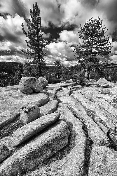 Black and white image of granite outcropping with boulders, Yosemite National Park, California, USA