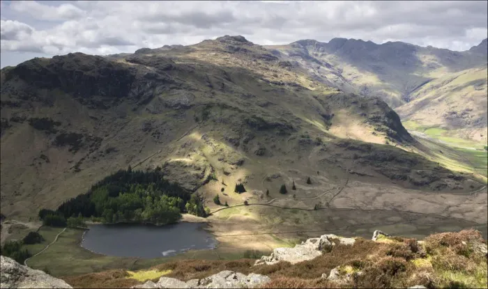 Framed Print : Blea Tarn. Mountain lake surrounded by rocky landscape of open hills Framed Print : Blea Tarn. Mountain lake surrounded by rocky landscape of open hills