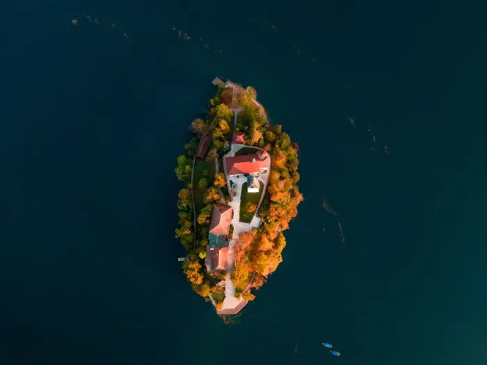 Framed Print : Bled Lake with Pilgrimage Church of the Assumption of Maria at sunrise. Aerial view Framed Print : Bled Lake with Pilgrimage Church of the Assumption of Maria at sunrise. Aerial view