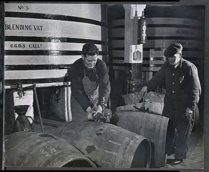 Framed Print : Blended Whiskey Piped From Blending Vat Framed Print : Blended Whiskey Piped From Blending Vat