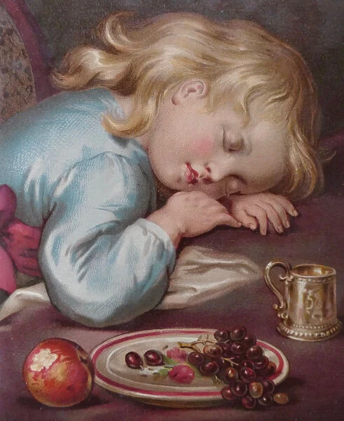 Blond girl sleeping on table after having eaten fruits