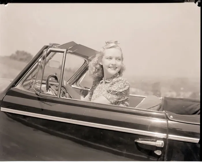 Framed Print : Blonde Woman Driving a Convertible Framed Print : Blonde Woman Driving a Convertible