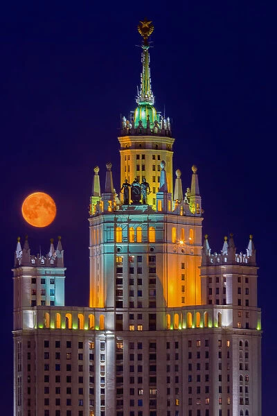 blood moon with one of seven sisters, moscow russia