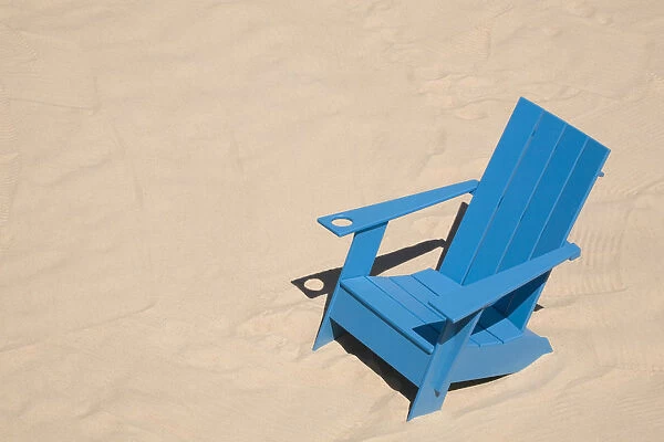 Blue adirondack chair standing on a beach, Old Port of Montreal, Quebec Province, Canada