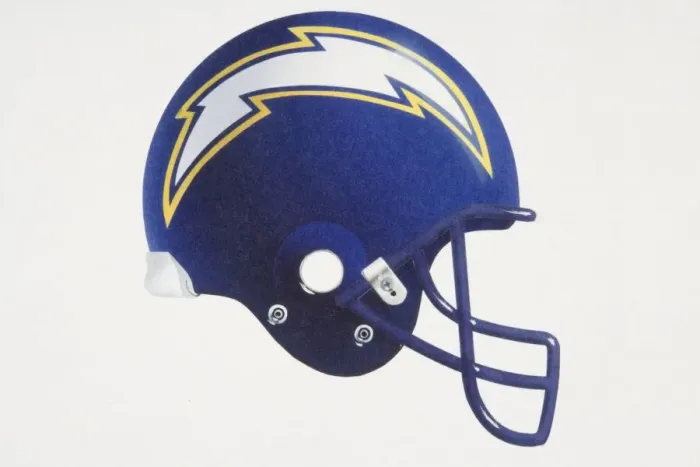 Framed Print : Blue American football helmet with lightning-shaped team logo, side view Framed Print : Blue American football helmet with lightning-shaped team logo, side view