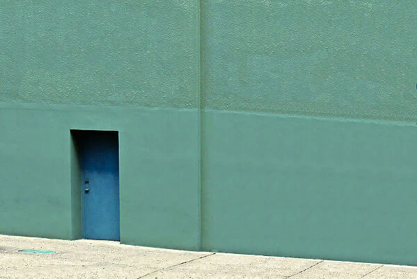 Blue Door. A color photograph of an entrance to a commercial building in downtown Portland