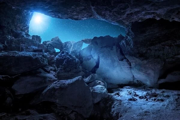 Blue Moon. Cave Moonbeams illuminating through an old Indian Cave on the
