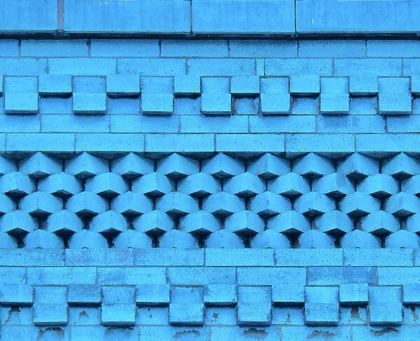 Blue Roof. A color photograph of the roof trim to a commercial building