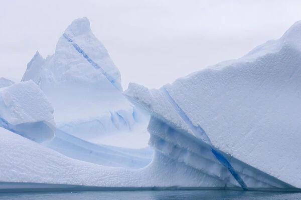 Blue stripe, frozen melt water in a white iceberg, Pleneau Bay, Antarctic Peninsula, Antarctica