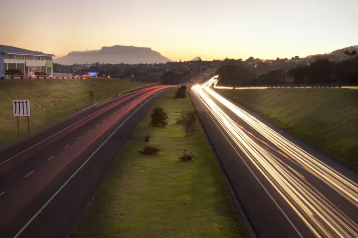 Framed Print : blurred motion, cape town, capital cities, car, color image, dusk, high angle view Framed Print : blurred motion, cape town, capital cities, car, color image, dusk, high angle view