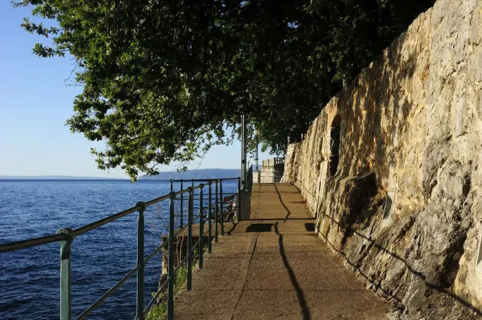 Framed Print : The boardwalk trail along the rocky coast, Lovran, Istria, Croatia Framed Print : The boardwalk trail along the rocky coast, Lovran, Istria, Croatia