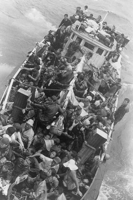 Framed Print : Boat Carrying Vietnamese Refugees in Water Framed Print : Boat Carrying Vietnamese Refugees in Water