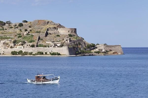 Boat off the Spinalonga peninsula, Kalidon, Elounda Gulf, Crete, Greece