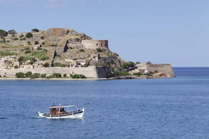 Framed Print : Boat off the Spinalonga peninsula, Kalidon, Elounda Gulf, Crete, Greece Framed Print : Boat off the Spinalonga peninsula, Kalidon, Elounda Gulf, Crete, Greece