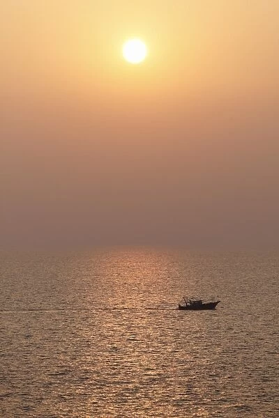 Boat on the sea, sunset, Kovalam, Kerala, southern India, India, Asia