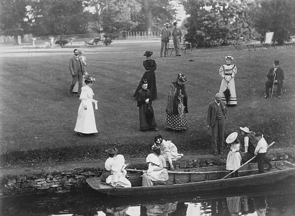 Boating. 1900: A group ready to go punting