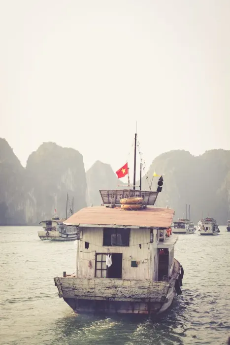 Framed Print : boats cruising around karst in the world famous place halong bay in north Vietnam Framed Print : boats cruising around karst in the world famous place halong bay in north Vietnam