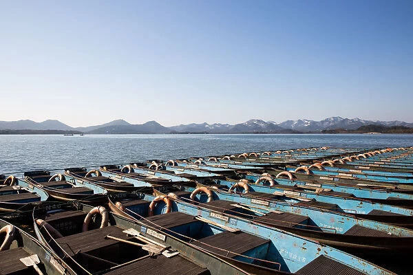 Boats docked on the West Lake, Hangzhou, Zhejiang, China