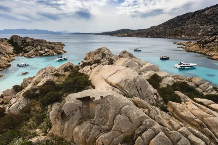 Framed Print : Boats in rocky cove, Maddalena Archipelago, Provincia di Olbia-Tempio, Italy