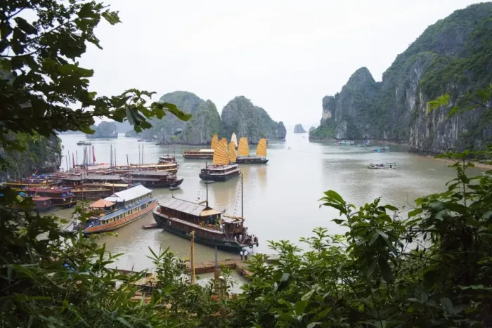 Framed Print : Boats and rocky islands in Vietnamese harbor Framed Print : Boats and rocky islands in Vietnamese harbor