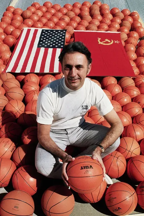 Framed Print : Bob Cousy Squatting Amidst Basketballs Framed Print : Bob Cousy Squatting Amidst Basketballs