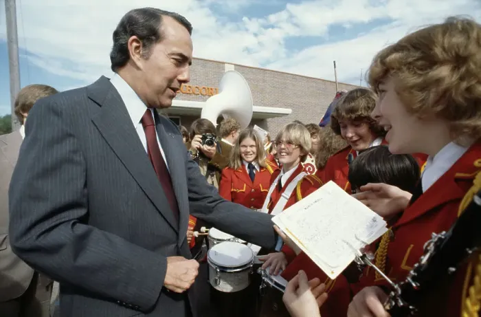 Framed Print : Bob Dole. Senator Bob Dole (1923 - 2021) meeting young musicians while Framed Print : Bob Dole. Senator Bob Dole (1923 - 2021) meeting young musicians while