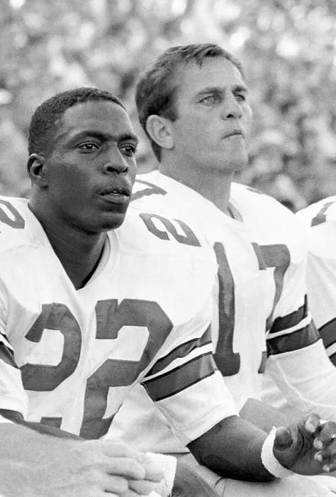 Framed Print : Bob Hayes and Don Meredith Watching Game
