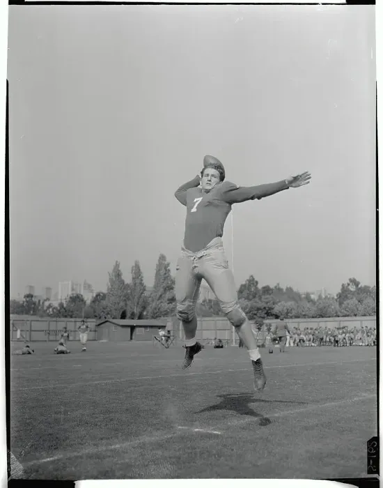 Framed Print : Bob Waterfield Jumping in the Air with Ball in Hand Framed Print : Bob Waterfield Jumping in the Air with Ball in Hand