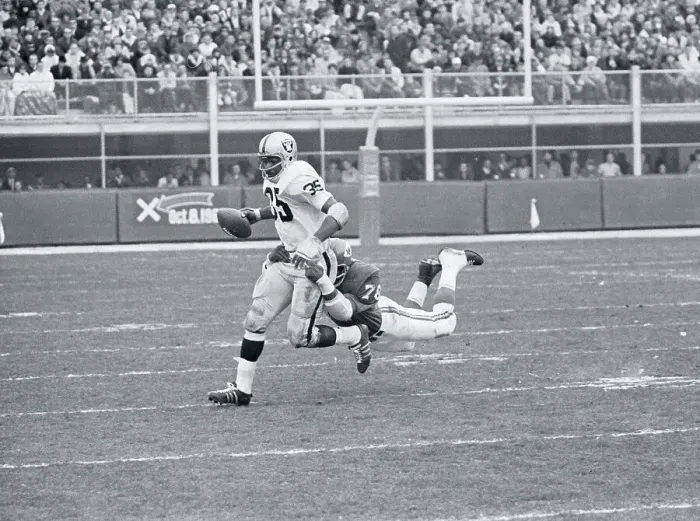 Framed Print : Bobby Bell Tackling Hewritt Dixon Framed Print : Bobby Bell Tackling Hewritt Dixon