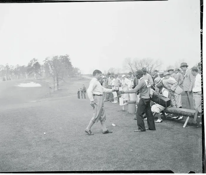 Framed Print : Bobby Jones Handing a Drink to His Caddy Framed Print : Bobby Jones Handing a Drink to His Caddy