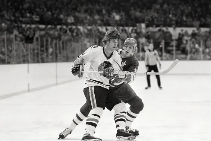 Framed Print : Bobby Orr And Steve Jensen Keeping in Check Framed Print : Bobby Orr And Steve Jensen Keeping in Check