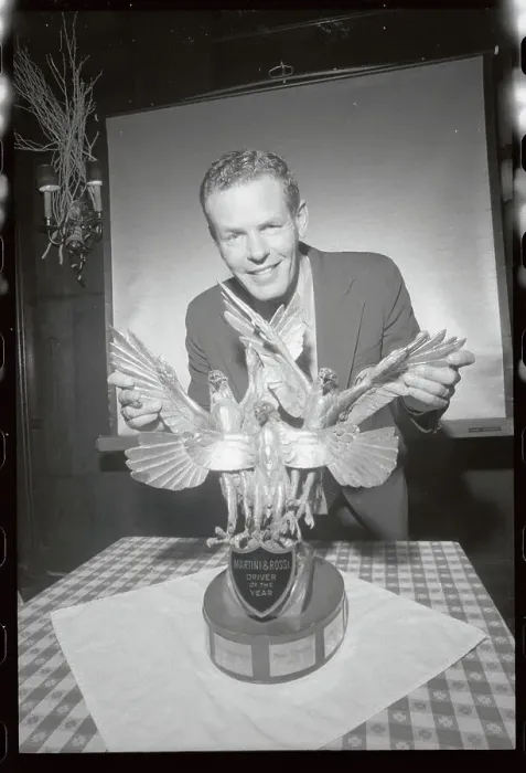Framed Print : Bobby Unser Holding Wing of His Golden Eagles Framed Print : Bobby Unser Holding Wing of His Golden Eagles