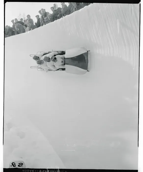 Framed Print : Bobsled Team Racing Down the Course Framed Print : Bobsled Team Racing Down the Course