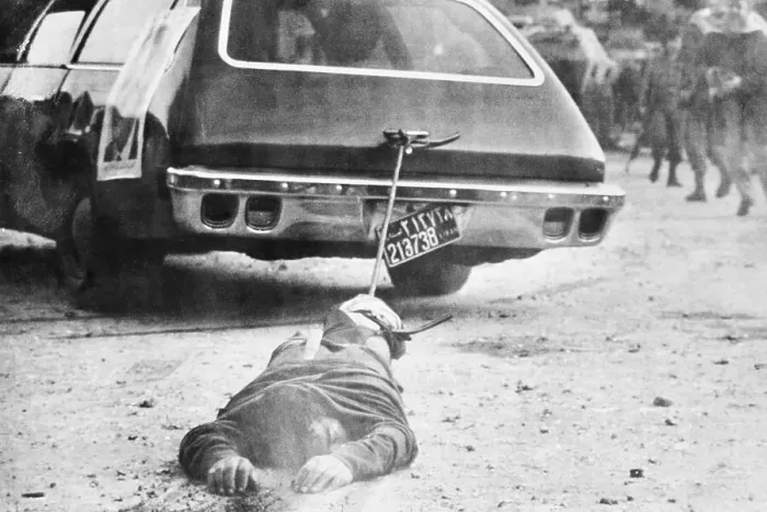 Framed Print : Body Being Dragged by Car