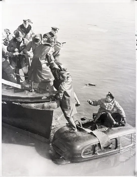 Framed Print : Body Of Woman Lifted From Car To Boat Framed Print : Body Of Woman Lifted From Car To Boat