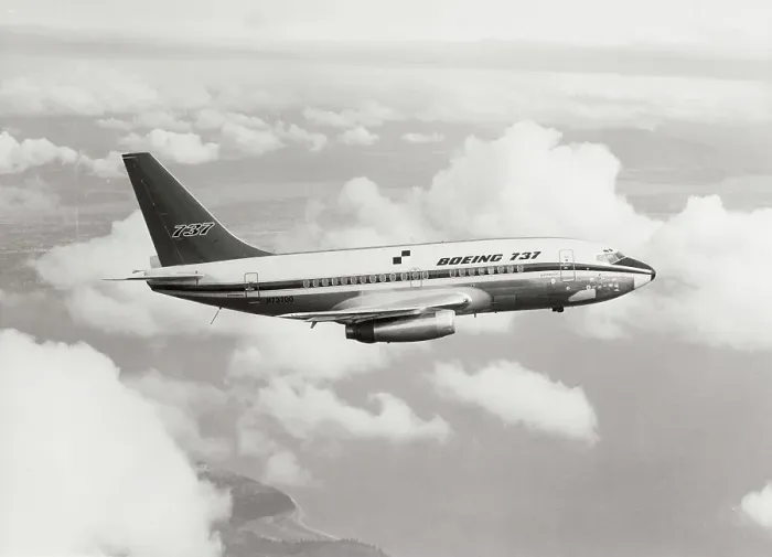 Framed Print : A Boeing 737 Airplane in Flight Framed Print : A Boeing 737 Airplane in Flight