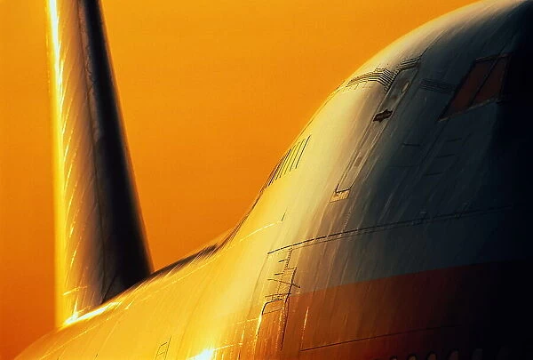 Boeing 747 passenger aircraft at sunset, close-up