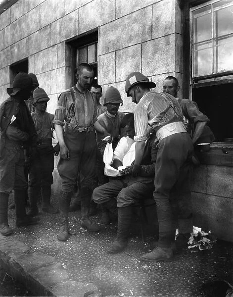 Boer War. circa 1900: Bandaging the wounded at a farmhouse during the Boer War