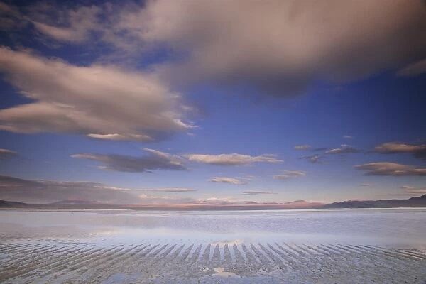 Bolivia, Salar de Uyuni, clouds reflecting in water