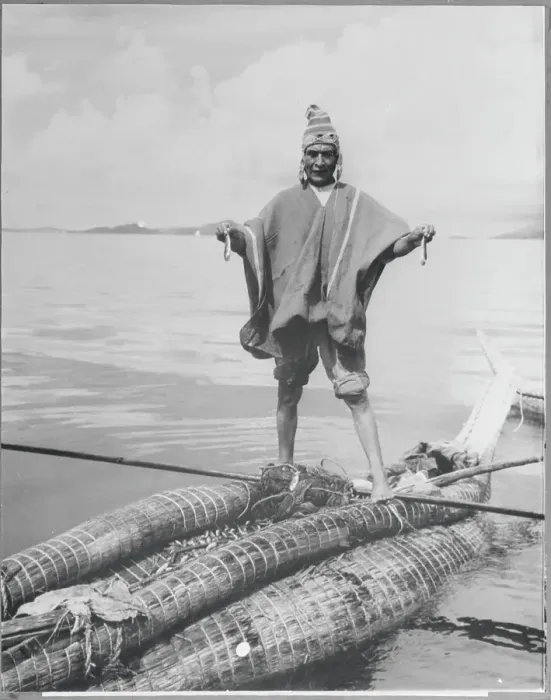 Framed Print : Bolivian Fisherman Holding Fish Framed Print : Bolivian Fisherman Holding Fish