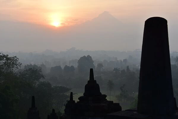 Borobudur at dusk, view on Merapi, Java